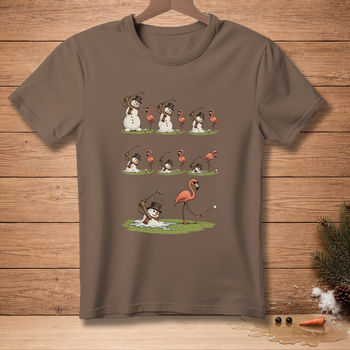 Snowmen golfing with flamingos on a brown t-shirt.
