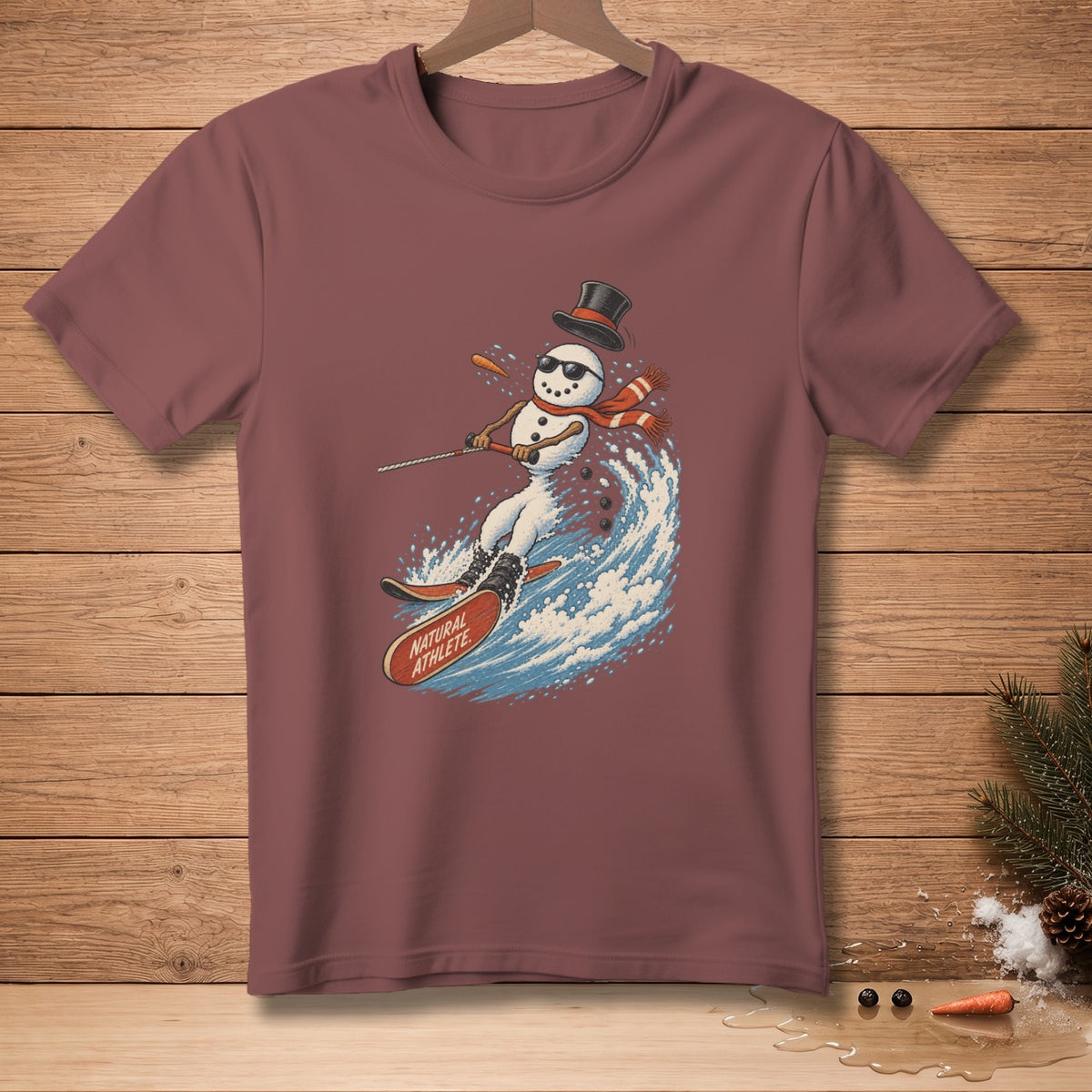 Snowman waterskiing with "Natural Athlete" text on skis.