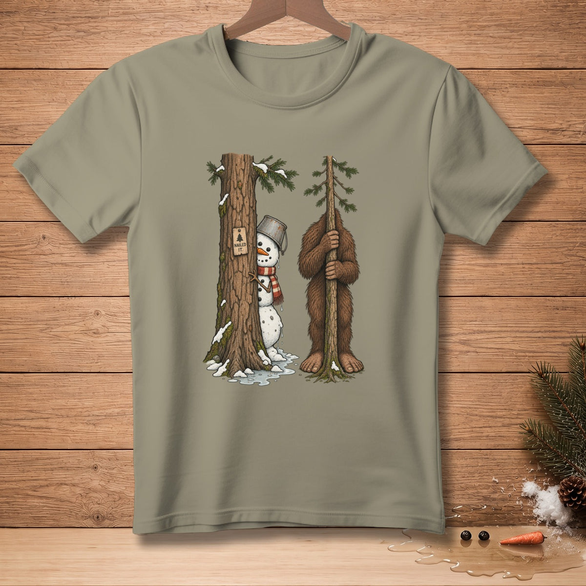 Snowman and Bigfoot peek from behind trees, with a "Nailed It." sign.