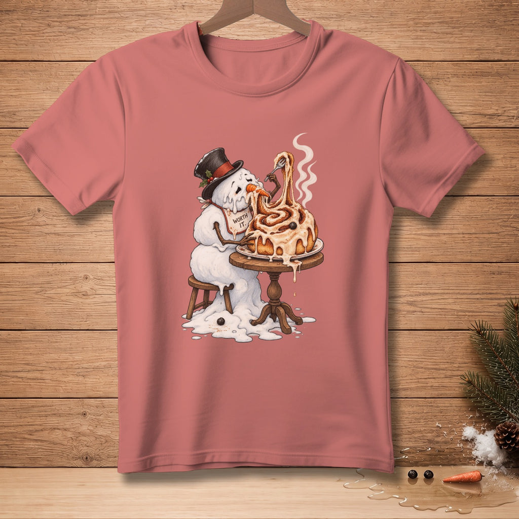 Snowman in a top hat eating a large cinnamon roll with "Worth It." bib.