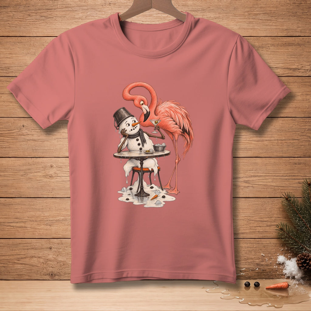 Pink t-shirt with cartoon of a flamingo offering a drink to a melting snowman.