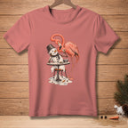 Pink t-shirt with cartoon of a flamingo offering a drink to a melting snowman.