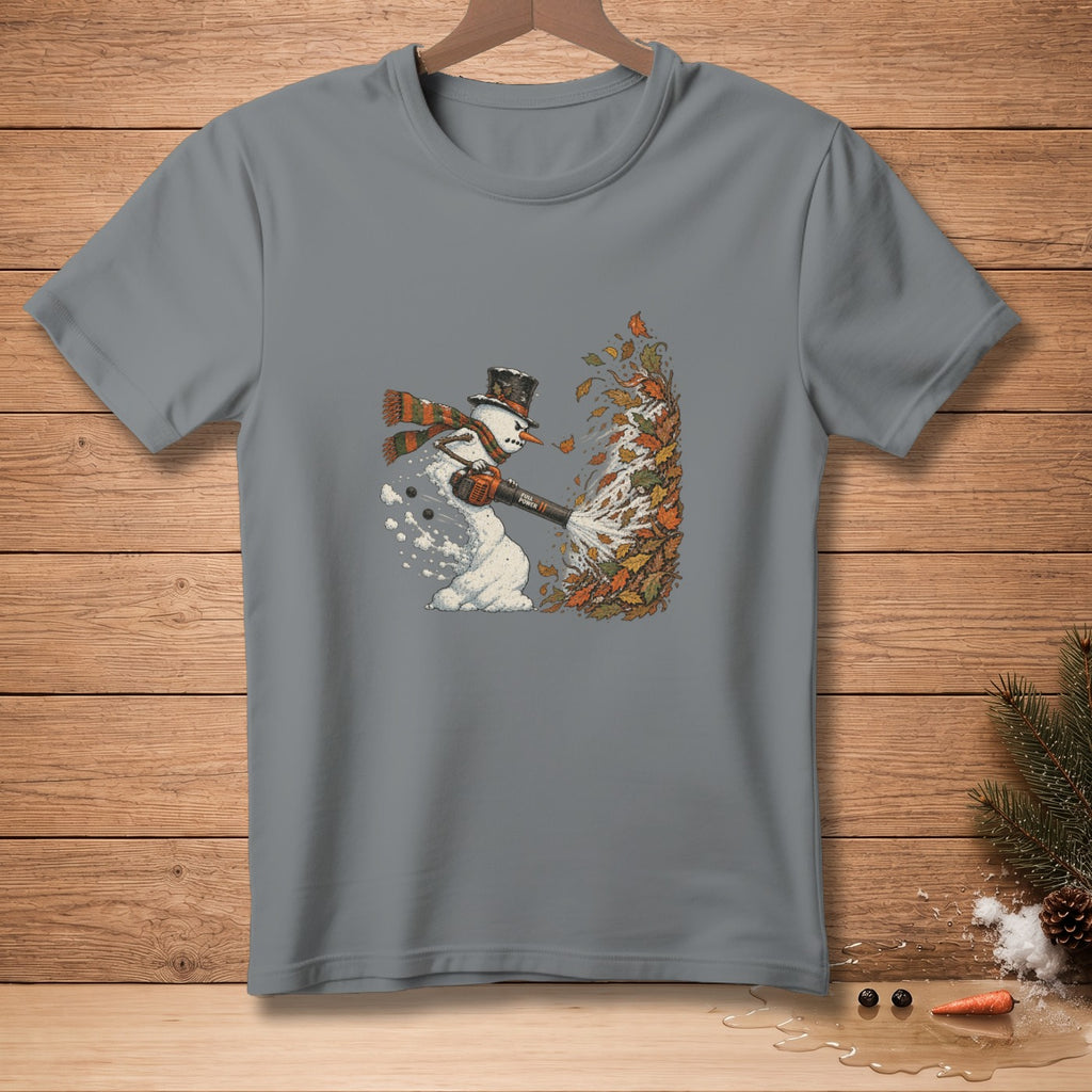 Snowman in a hat and scarf blowing leaves with a leaf blower.
