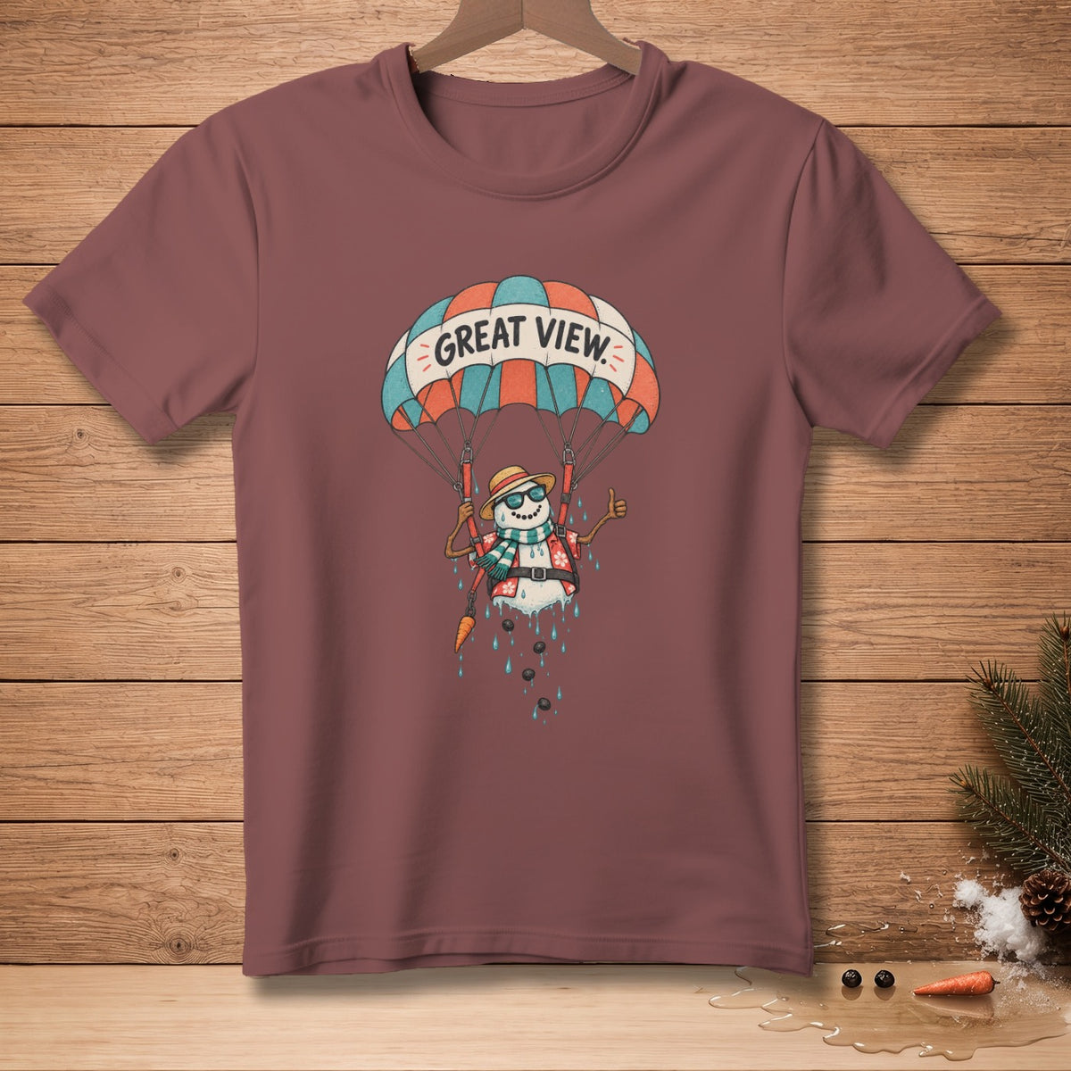 T-shirt with snowman parachuting with text "GREAT VIEW."