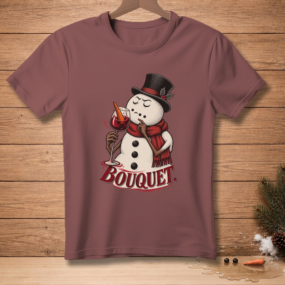 Burgundy t-shirt with a snowman wearing a top hat and scarf, holding wine.