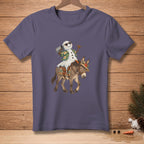 Snowman wearing sunglasses and Hawaiian shirt rides a donkey.