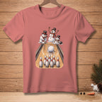 Three snowmen in hats bowling on a lane with a rolling ball and pins.