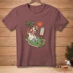 Melting snowman plays mini golf with palm tree and sunny sky on a t-shirt.