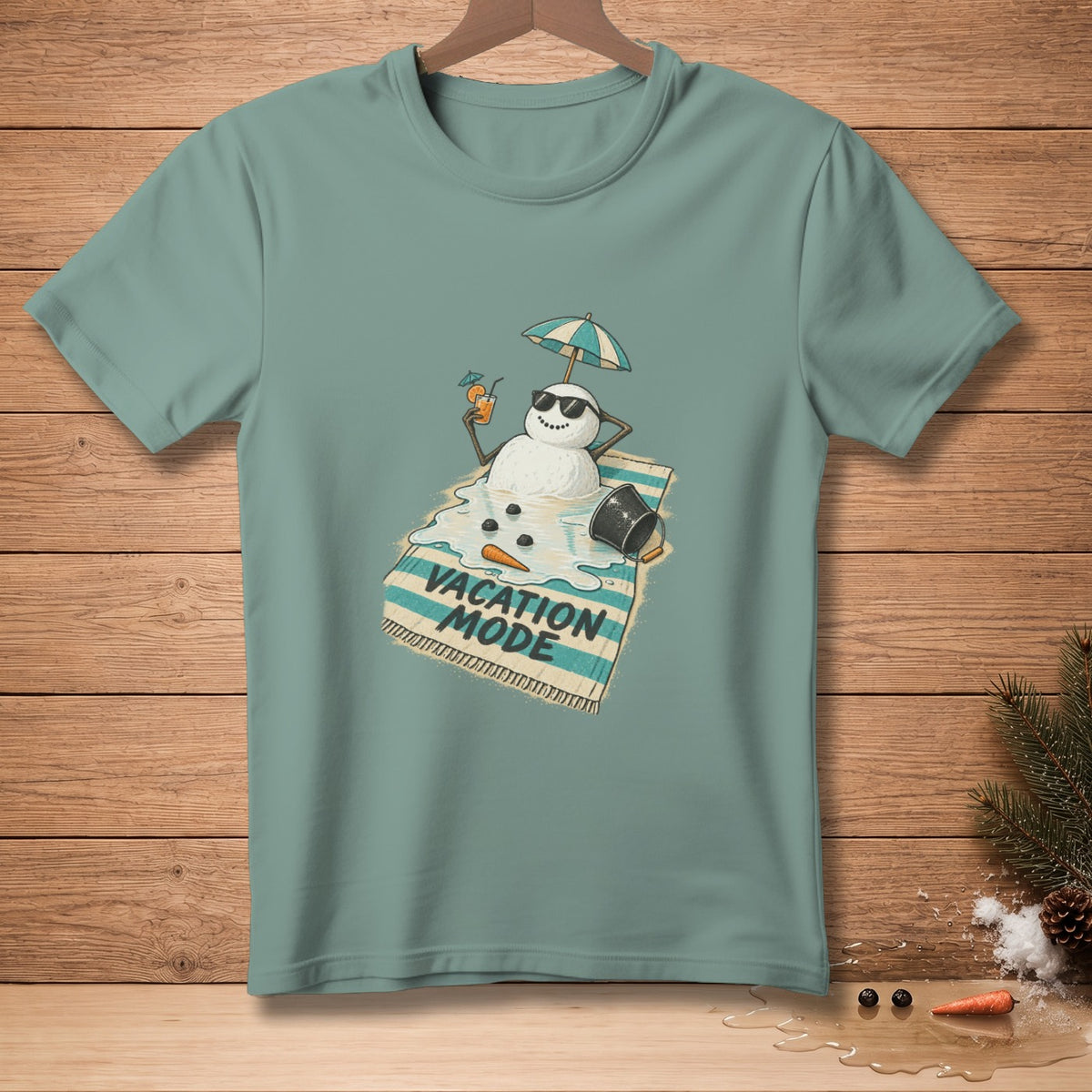 Snowman melting on a beach towel, text reads VACATION MODE.