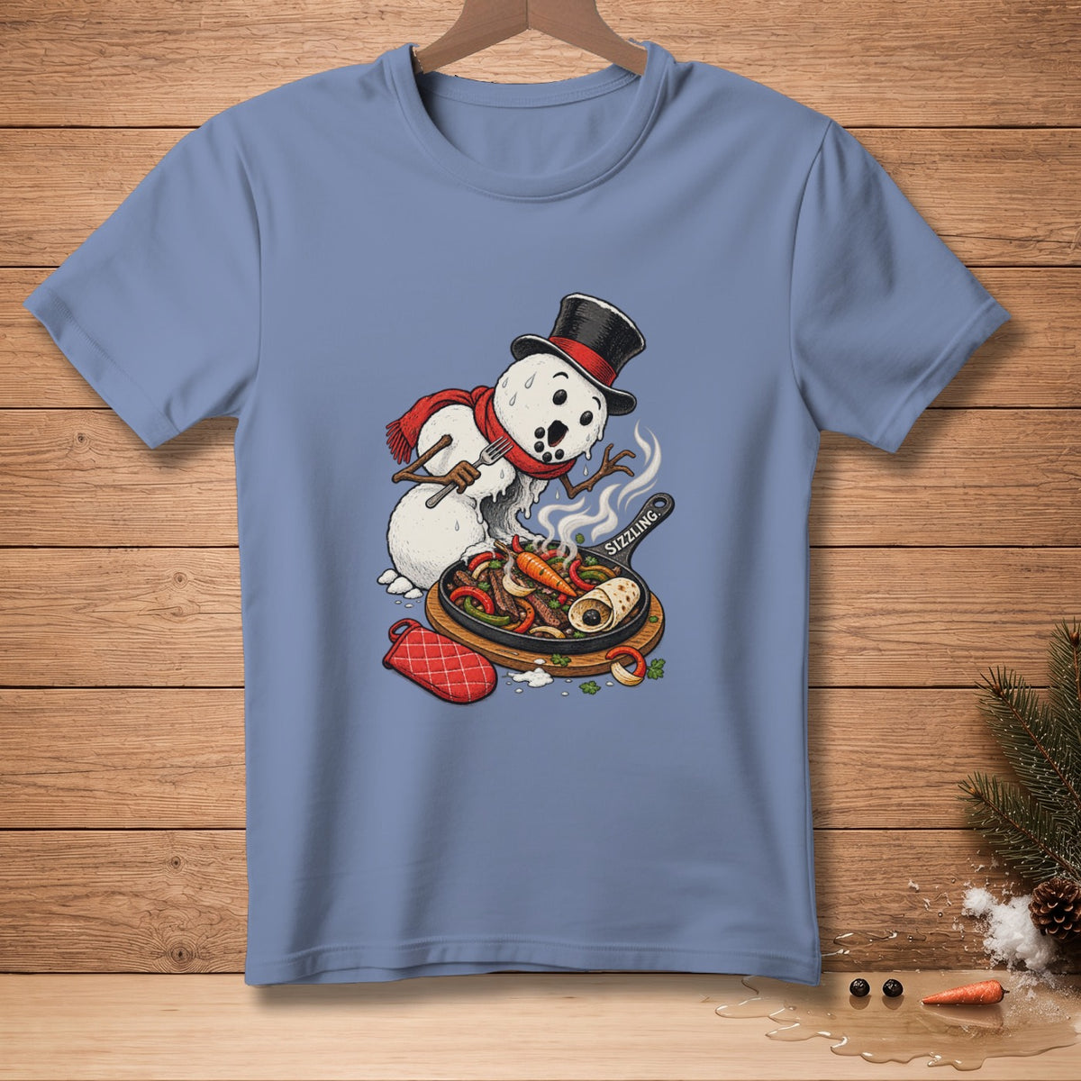 Snowman with top hat and scarf cooking sizzling fajitas on a cast iron skillet.