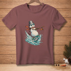 Snowman surfing on a surfboard with "Still Up" text, wearing sunglasses and a scarf.