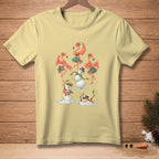 Light yellow t-shirt with dancing flamingos and melting snowmen graphic.