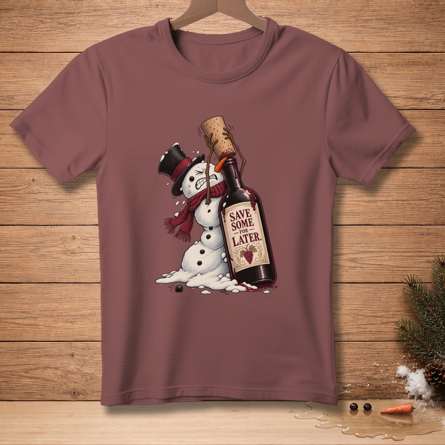 T-shirt with a melting snowman struggling with a wine bottle labeled "Save Some For Later."