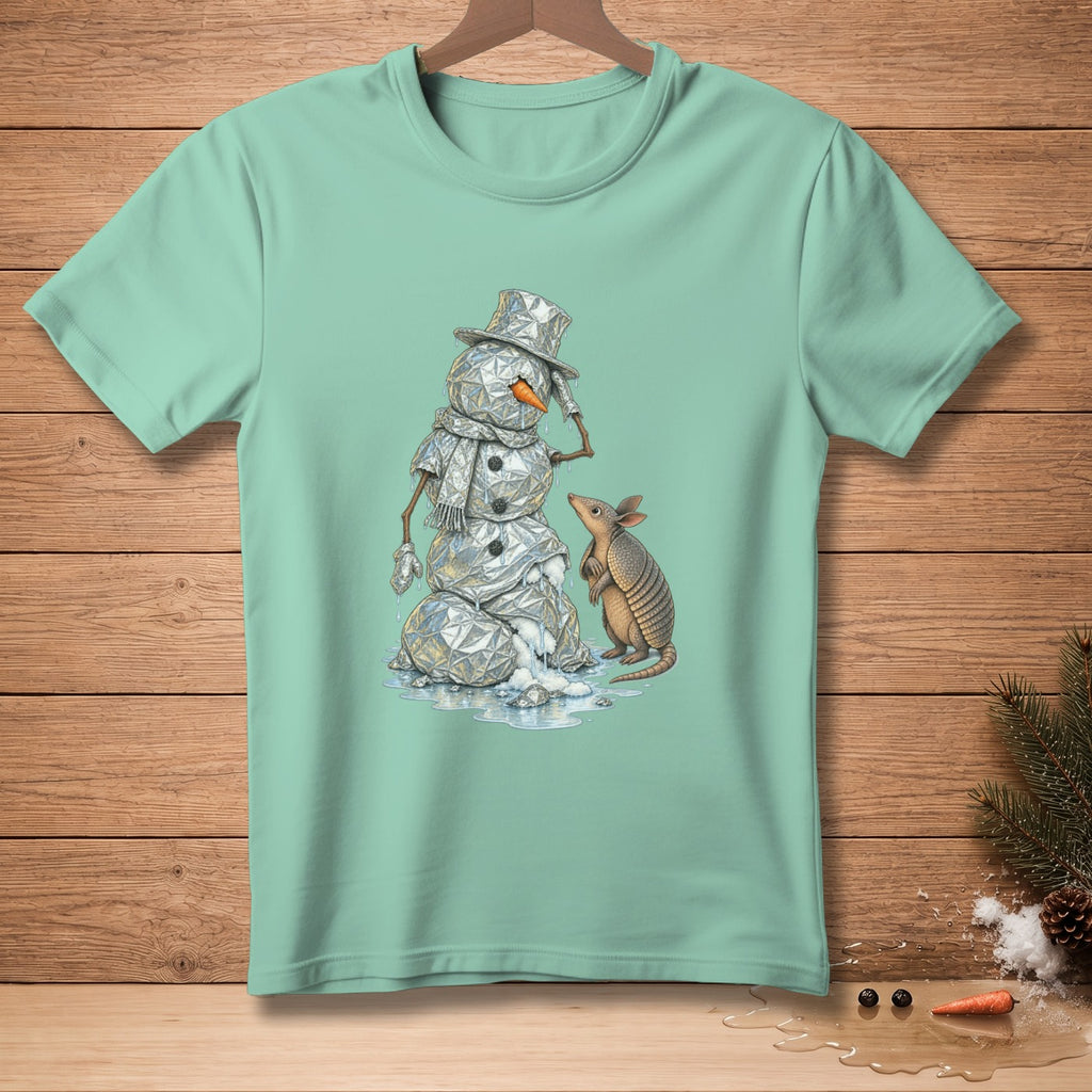 Snowman with top hat and scarf interacts with an armadillo on a light teal shirt.
