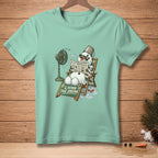 T-shirt with melting snowman reading newspaper and fan. "Living the dream."