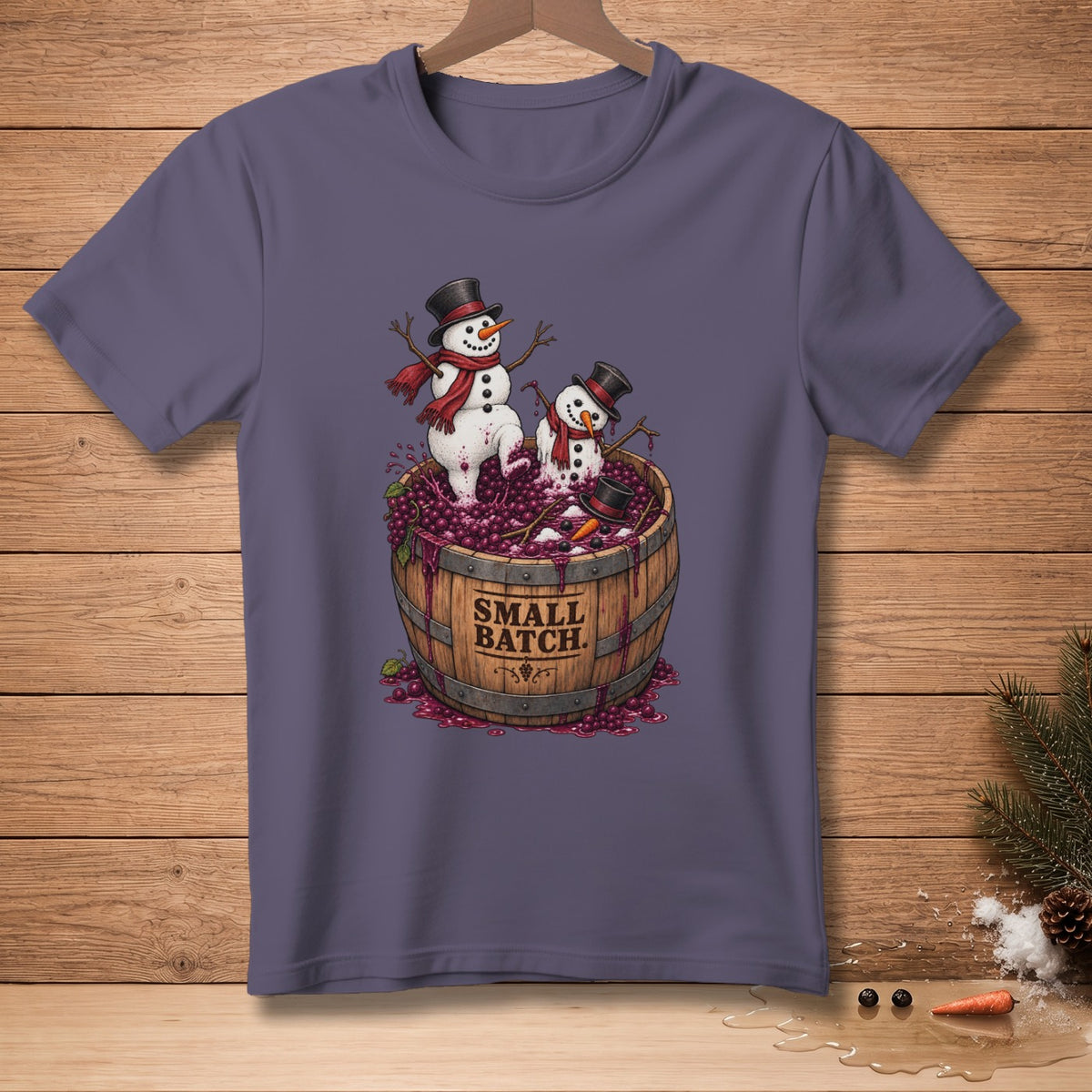 Snowmen in a barrel of grapes with "SMALL BATCH" text on the barrel.