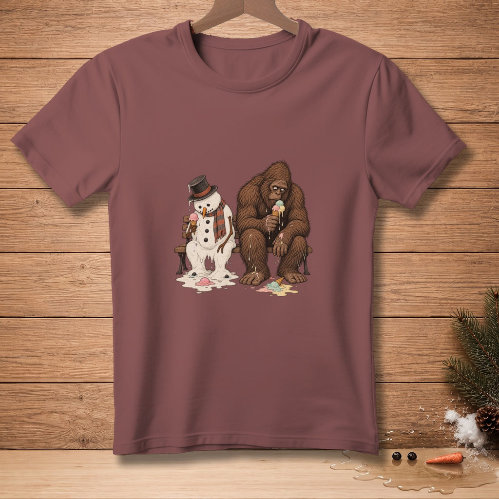 Melting snowman and Bigfoot sitting on a bench, eating melting ice cream cones.