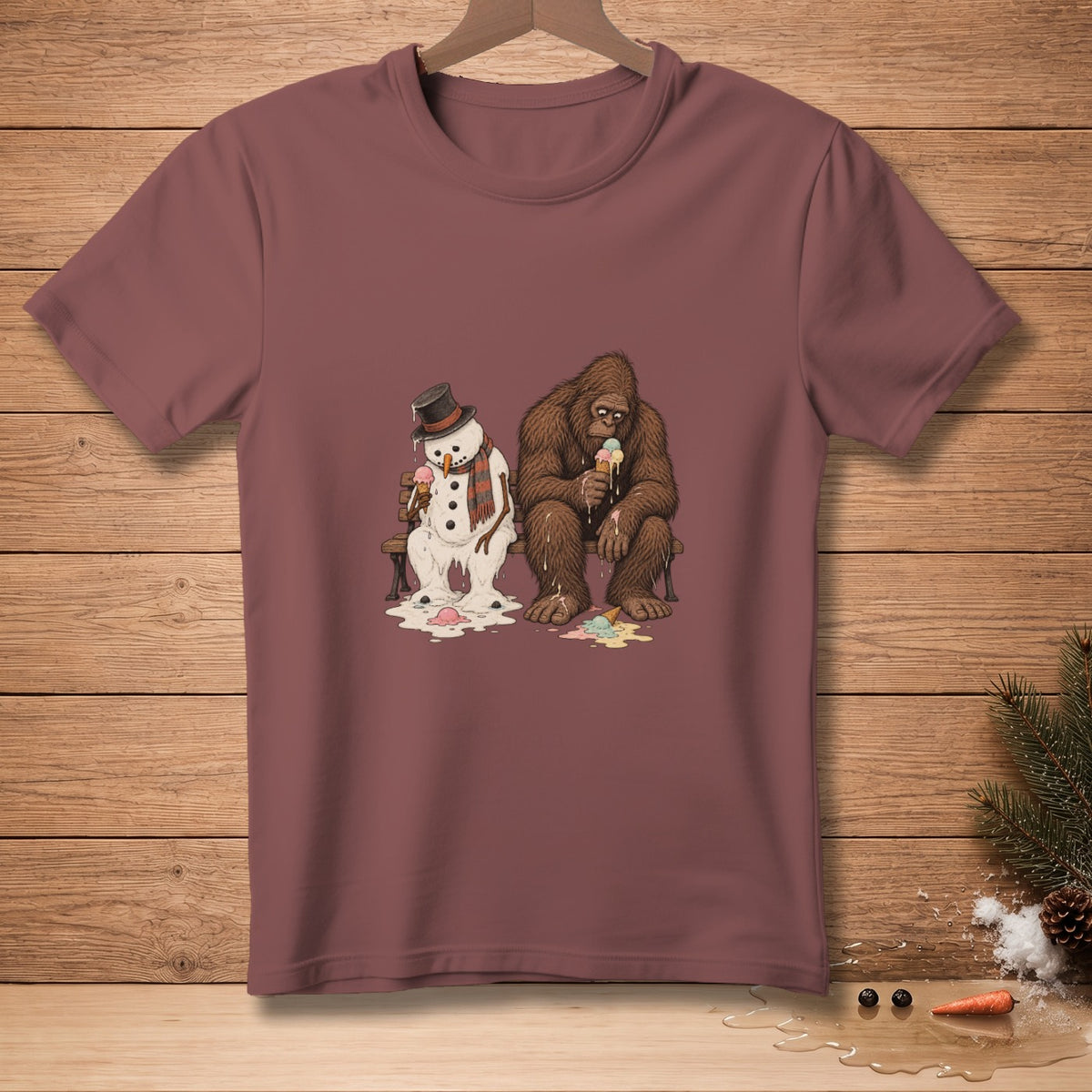 Melting snowman and Bigfoot sitting on a bench, eating melting ice cream cones.