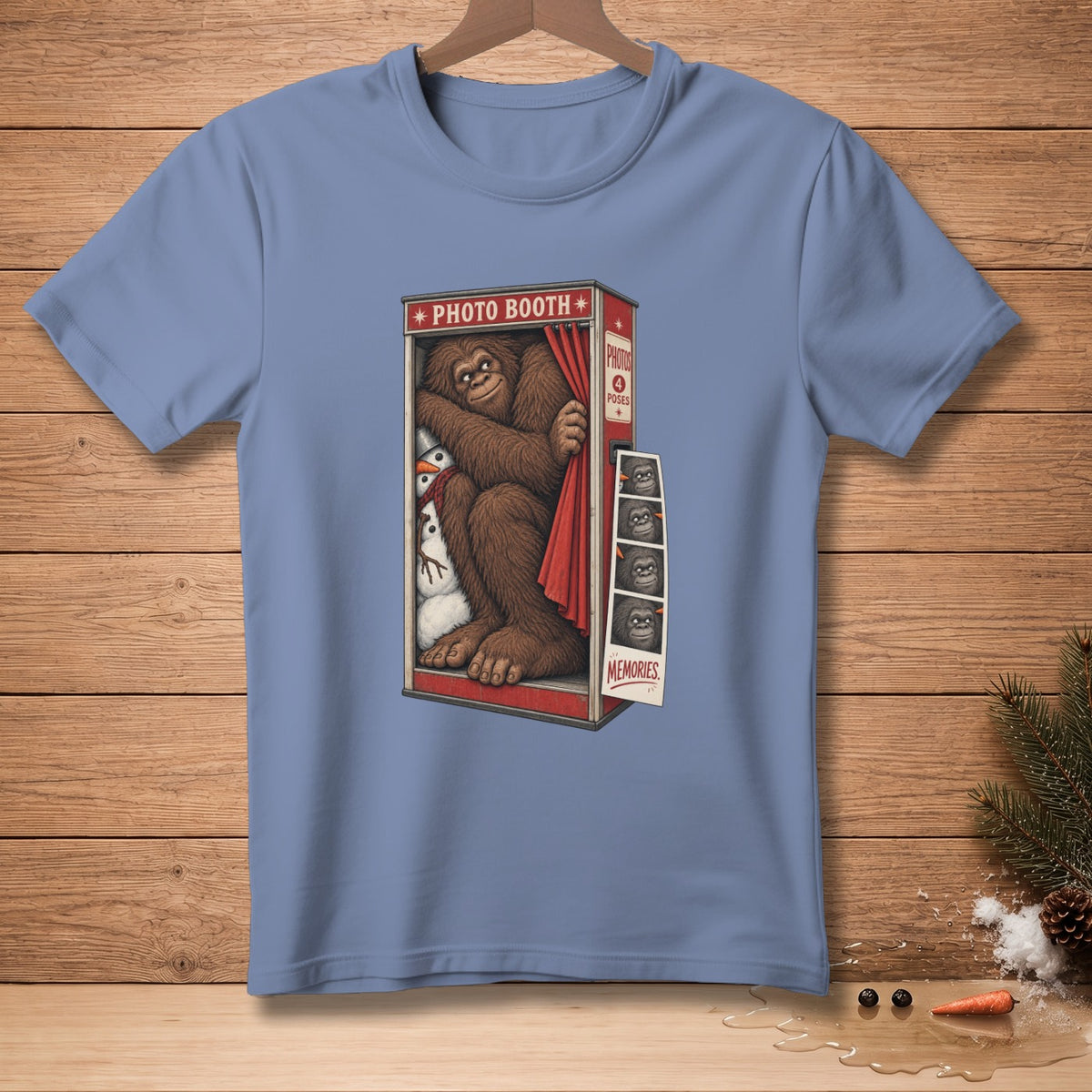Bigfoot and snowmen in a photo booth with "Memories" printed below photo strips.