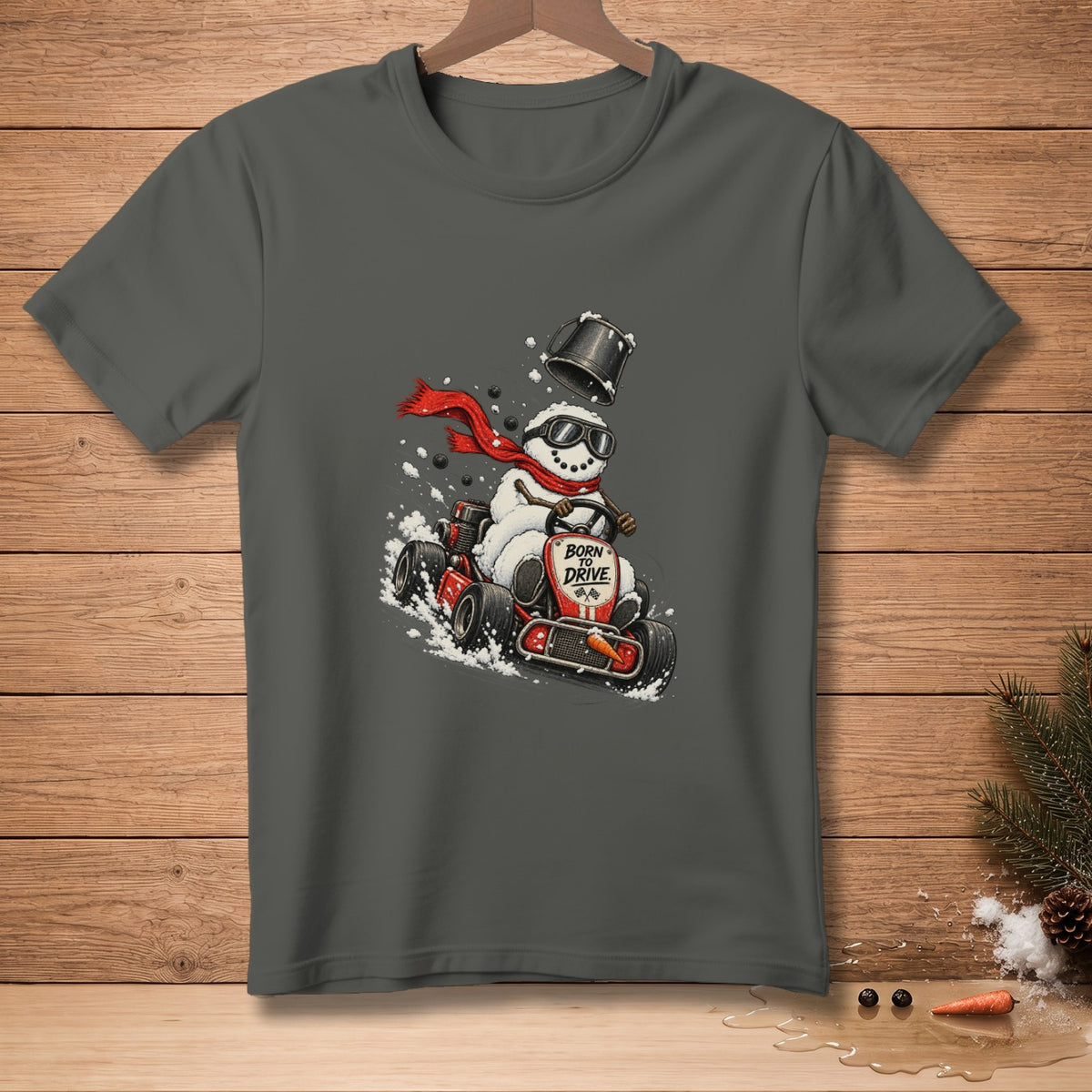 Snowman wearing goggles and scarf, racing a go-kart with "Born to Drive" text.