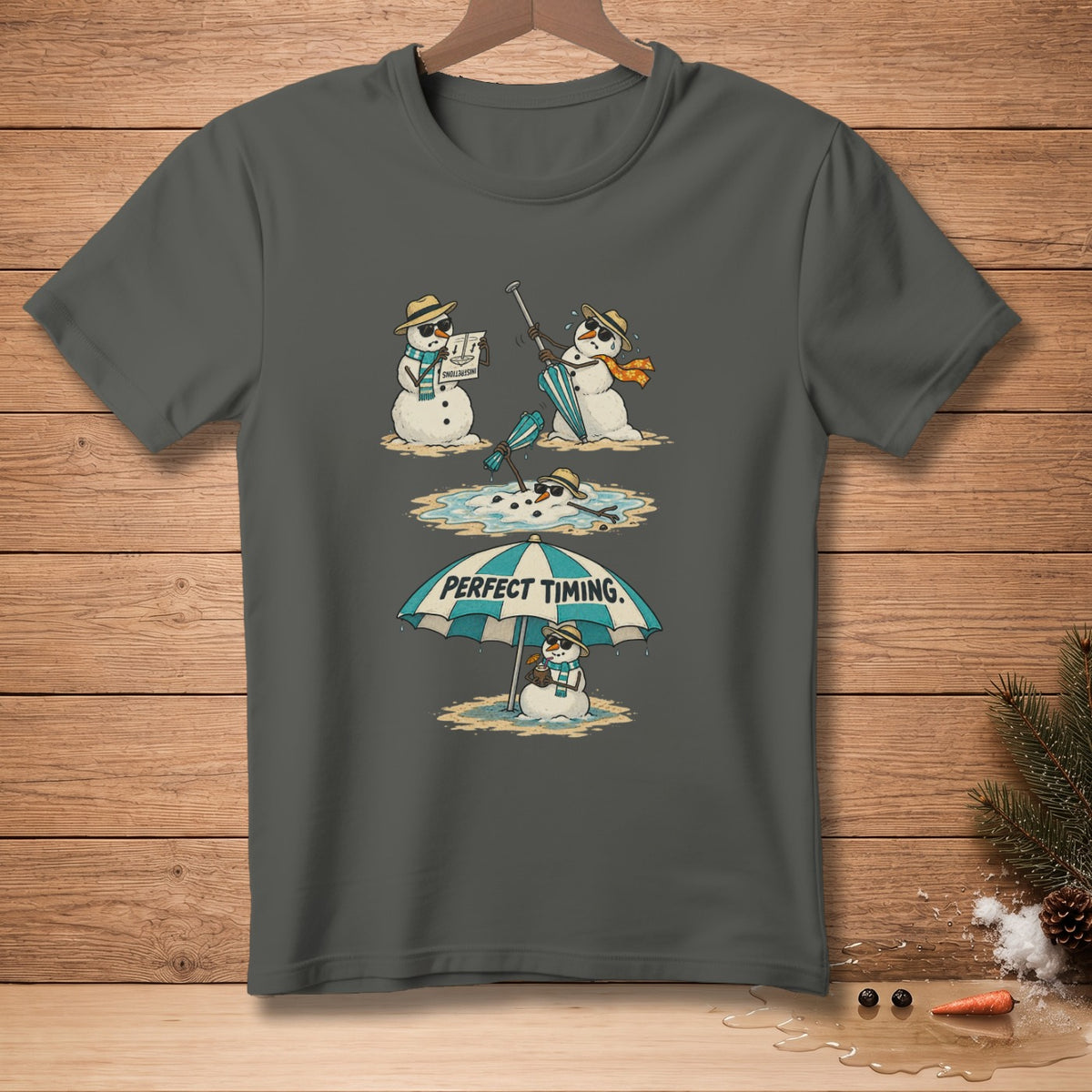 T-shirt graphic with snowmen melting and a snowman under an umbrella that says "Perfect Timing."