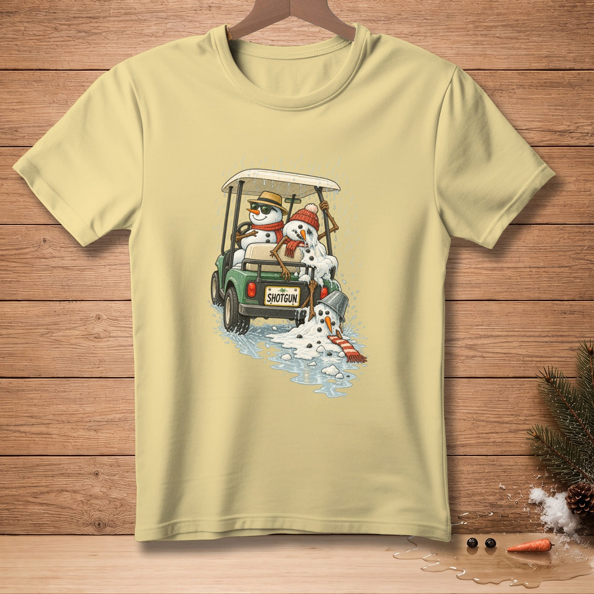 Two melting snowmen in a golf cart with "Shotgun" on the back.