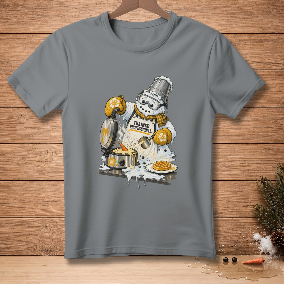 Snowman wearing an apron that says "Trained Professional" making waffles.