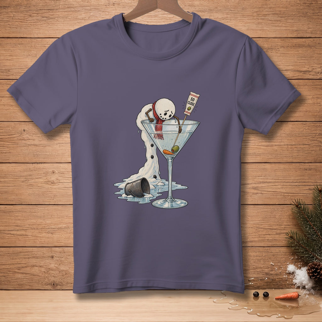 Melting snowman in martini glass with "So Close" label and olives.