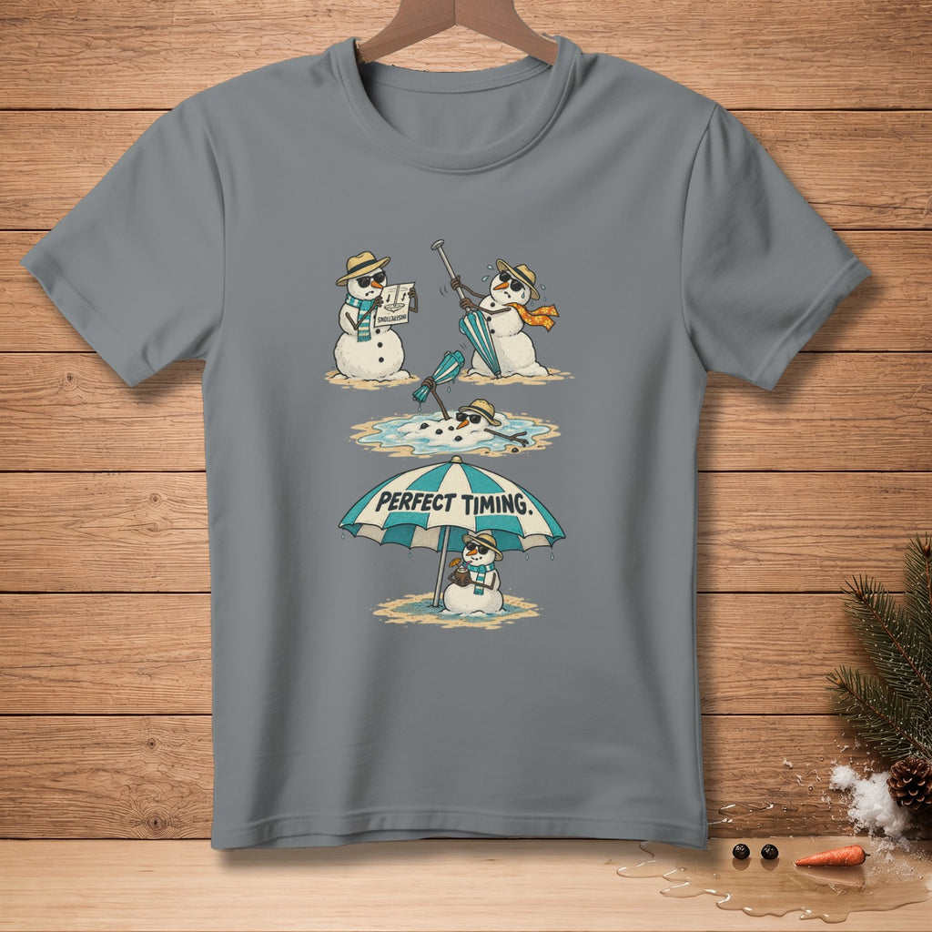 T-shirt graphic: melting snowmen on beach under umbrella, text "PERFECT TIMING."
