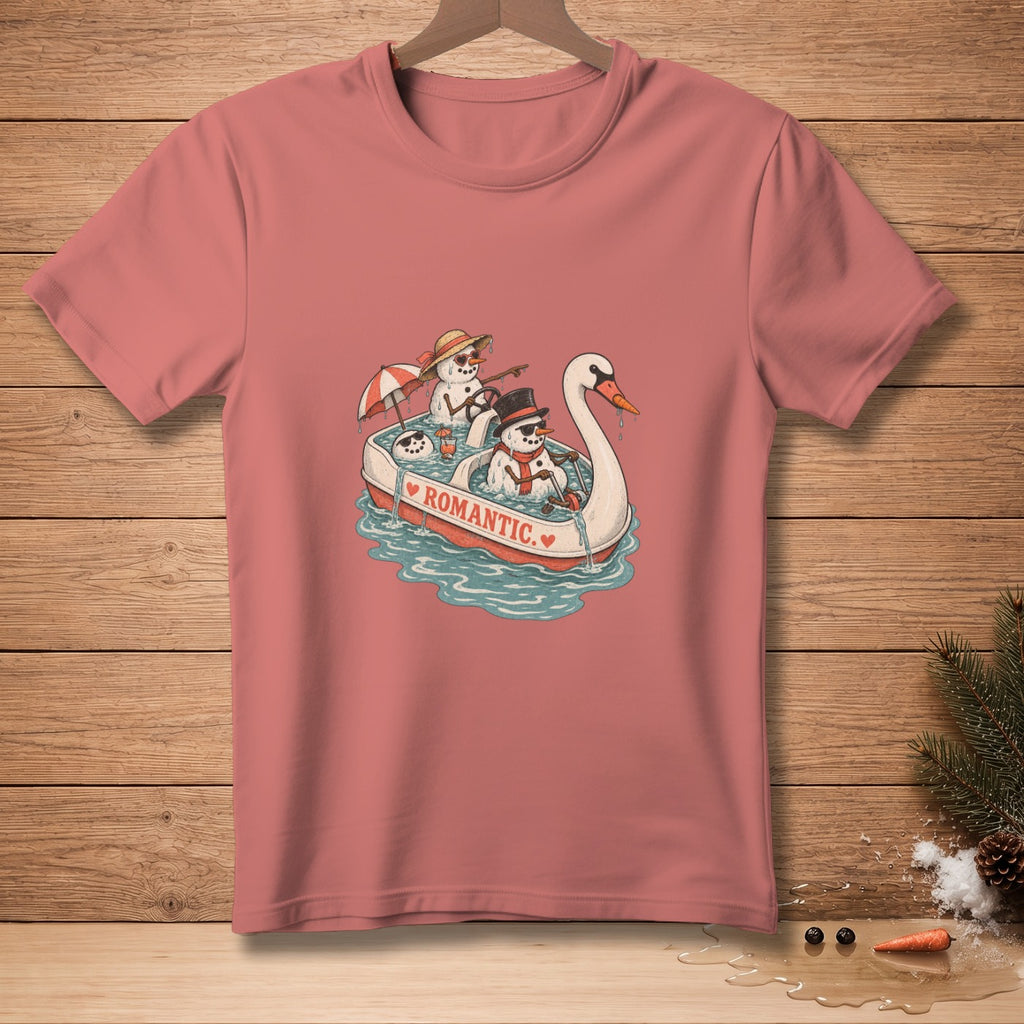 Snowmen in a swan boat with "ROMANTIC" text, on a pink t-shirt.