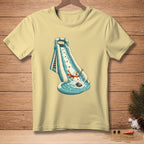 Yellow t-shirt with a snowman sliding down a water slide into a pool.