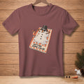 T-shirt with melting snowman wearing sunglasses and a hat, with text.