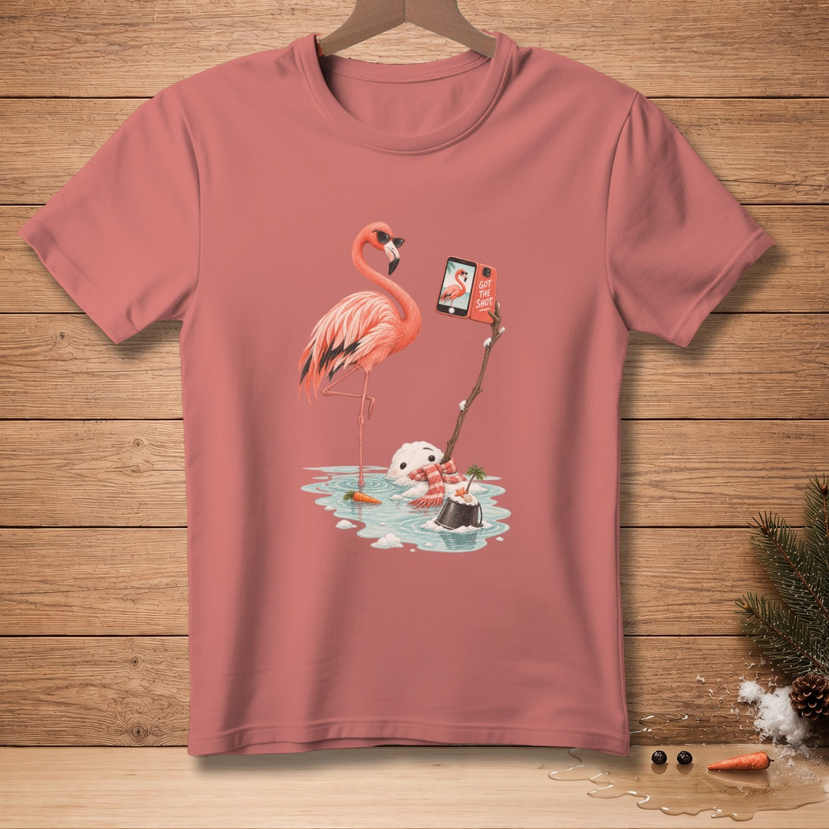 Flamingo wearing sunglasses takes a selfie with melting snowman saying "Got the Shot".