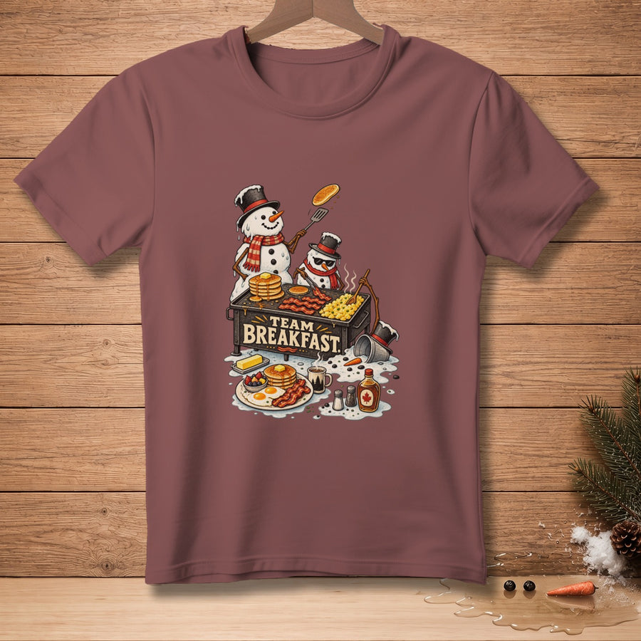 Snowmen cooking breakfast on a griddle with the text "TEAM BREAKFAST".