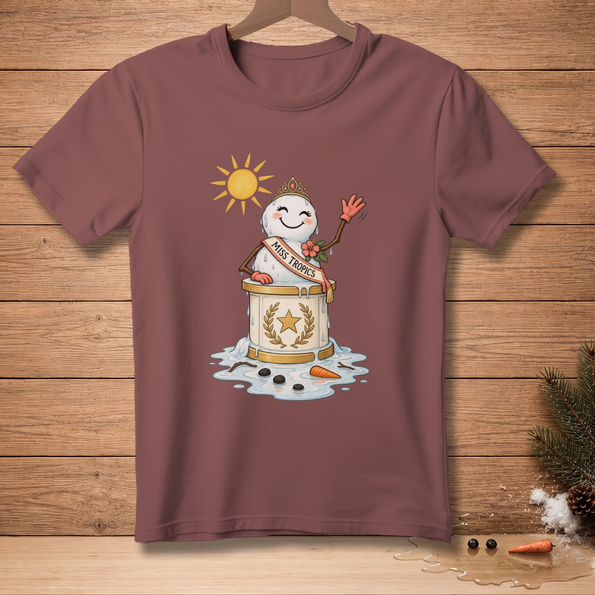 Snowman wearing a crown and "Miss Tropics" sash melts under a sun.