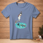 Snowman on diving board over pool with scattered snowman parts and bucket.