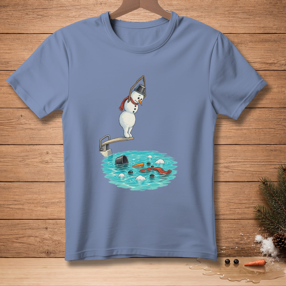 Snowman on diving board over pool with scattered snowman parts and bucket.