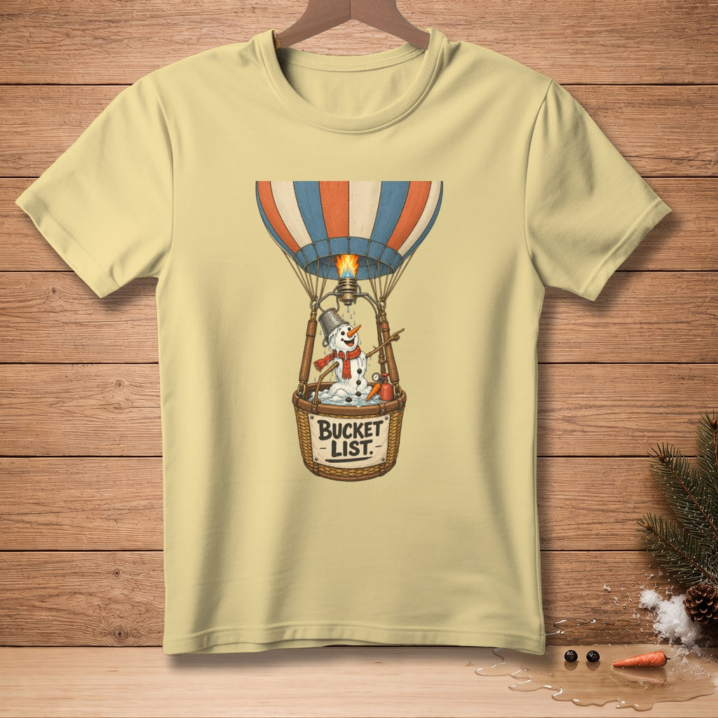 Yellow t-shirt with illustration of a melting snowman in a hot air balloon basket labeled "Bucket List".