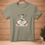 T-shirt with a graphic of three snowmen stacked, wearing hats and scarves.