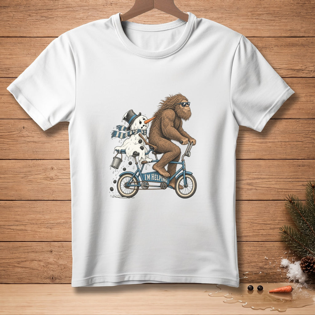 Bigfoot rides bicycle with melting snowman and text "I'M HELPING".