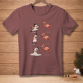 Snowmen in fencing poses and a melting snowman interact with flamingos.