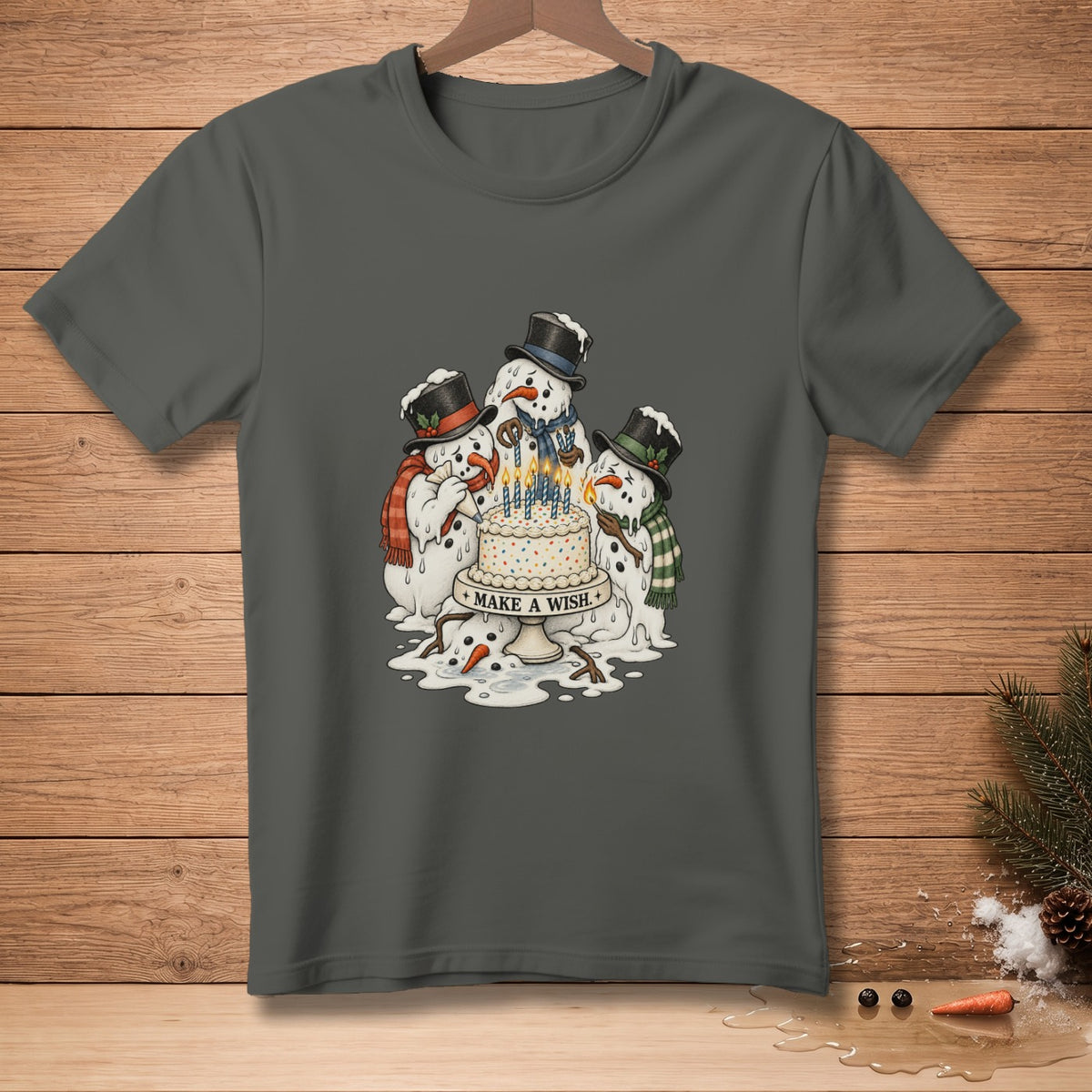 Three melting snowmen in hats and scarves gather around a birthday cake with candles.