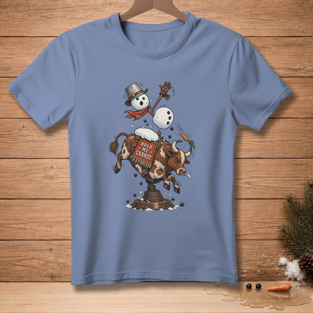 T-shirt graphic of snowman riding mechanical bull with text "Hold My Carrot."