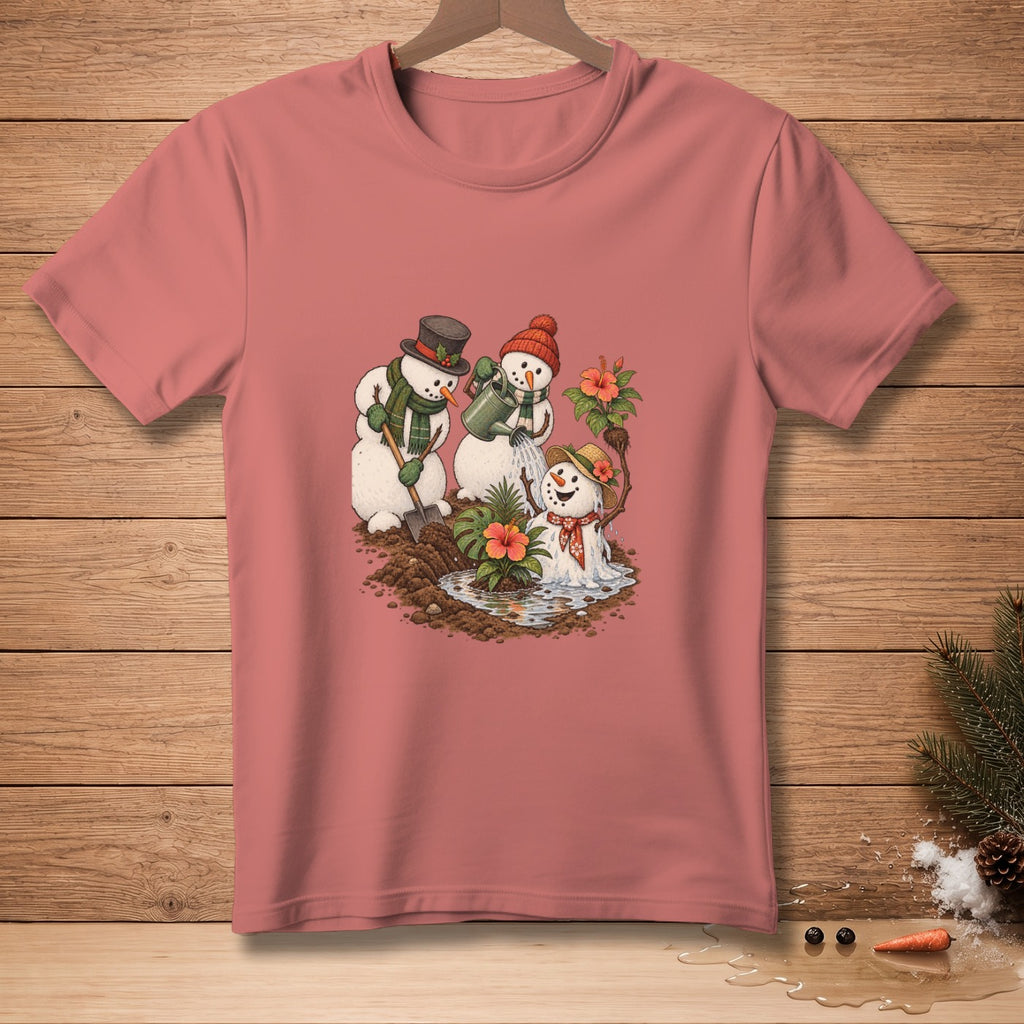 T-shirt with a graphic of snowmen watering plants and digging in the dirt.