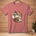 T-shirt with a graphic of snowmen watering plants and digging in the dirt.