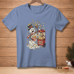 Melting snowman covered in popcorn with a popcorn machine and bucket.