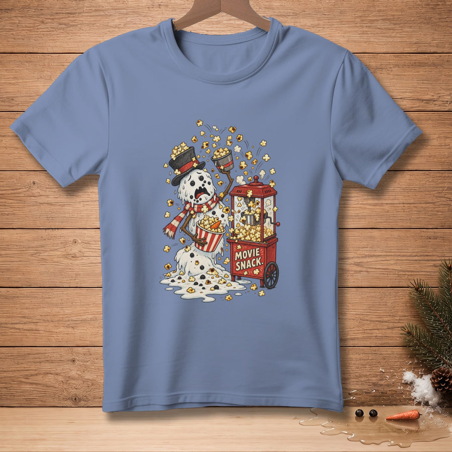 Melting snowman covered in popcorn with a popcorn machine and bucket.