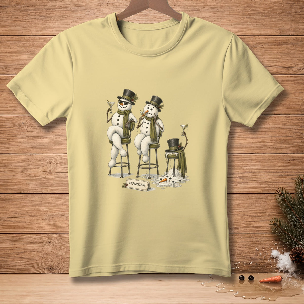 T-shirt with two snowmen sitting on stools drinking cocktails.