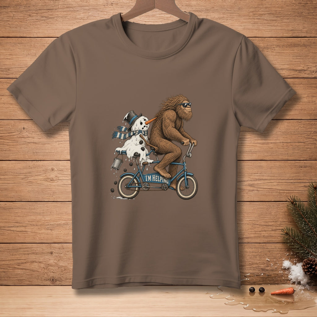 Bigfoot rides a tandem bicycle with a melting snowman and the text "I'M HELPING".