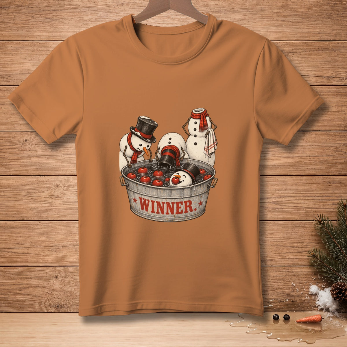 Snowmen bobbing for apples in a tub labeled "WINNER".